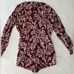 Catch Me long sleeve romper, never worn, size small